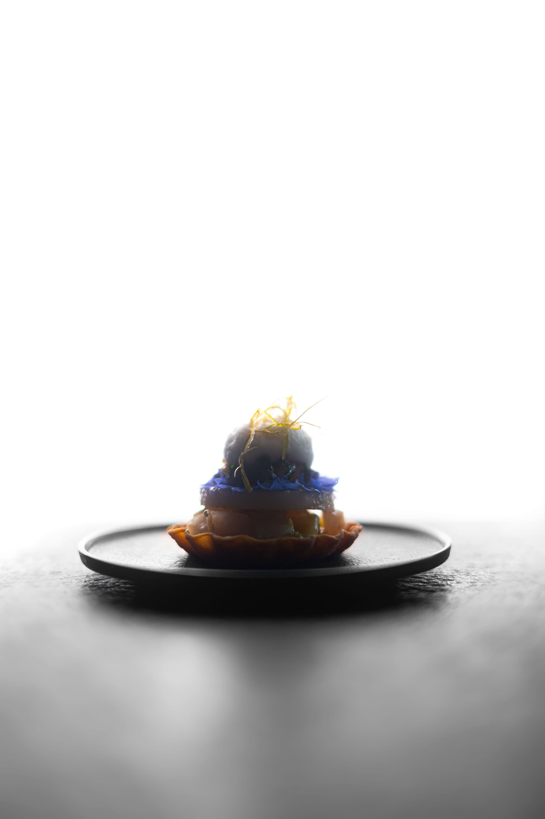 Japanese striped jack served with gently poached pear in herring milk