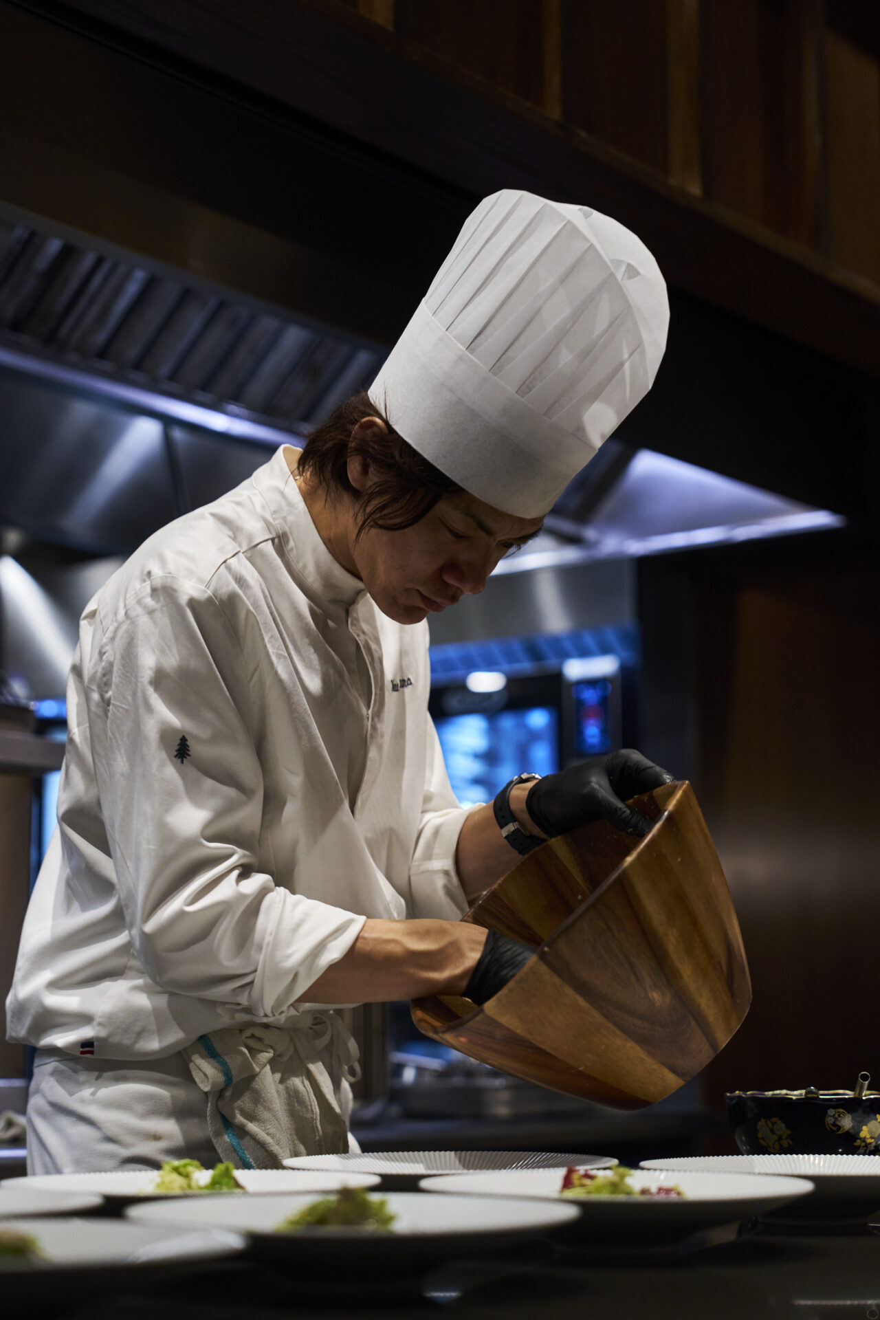 Chef's
   hands preparing a course